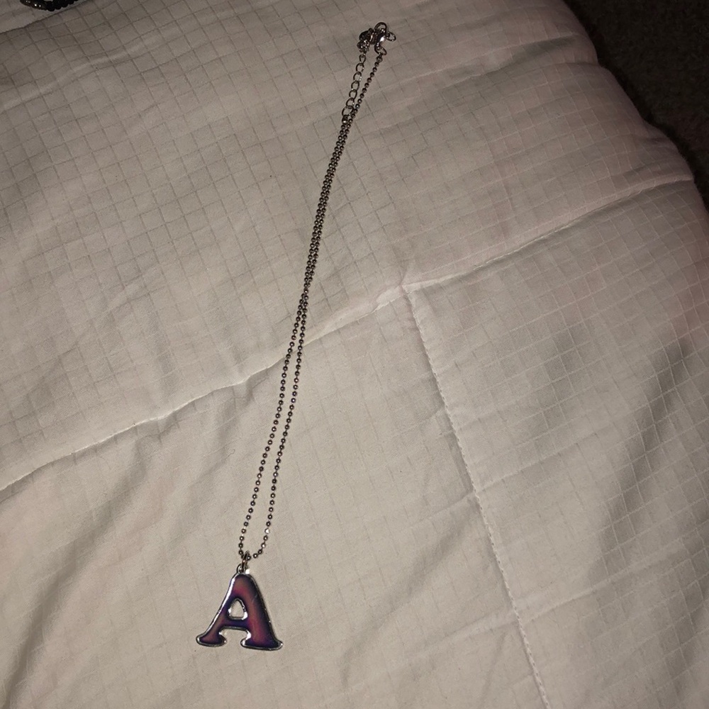 Claire’s “A” mood necklace